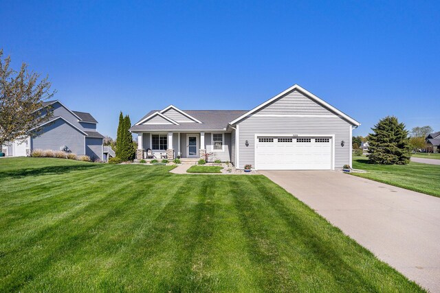 3080 Silver Fir Ct, Holland, MI 49424 - single story home with a garage, a front yard, driveway, and a porch