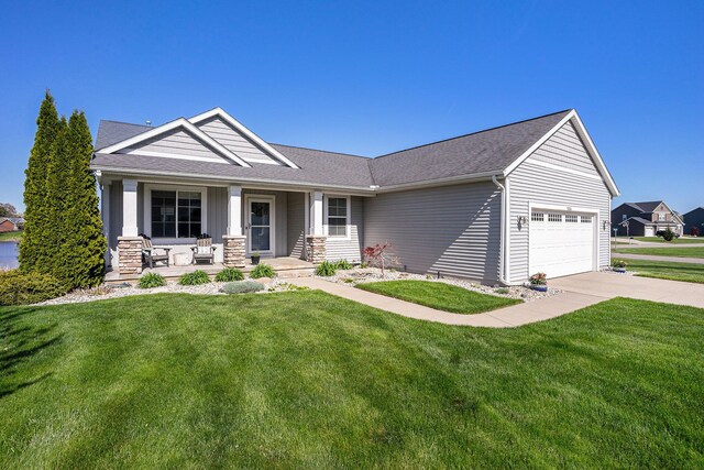3080 Silver Fir Ct, Holland, MI 49424 - view of front facade with a porch, a garage, driveway, a front lawn, and a shingled roof