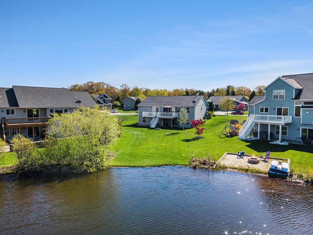 3080 Silver Fir Ct, Holland, MI 49424 - water view featuring stairs, a fire pit, and nearby suburban area