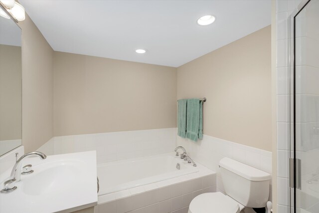223 E Ann St Unit 1, Ann Arbor, MI 48104 - full bath featuring recessed lighting, a shower stall, toilet, and a bath