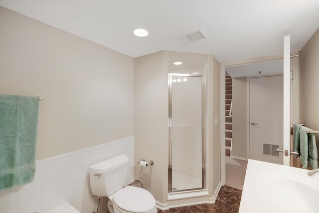 223 E Ann St Unit 1, Ann Arbor, MI 48104 - bathroom with visible vents, recessed lighting, a stall shower, and toilet