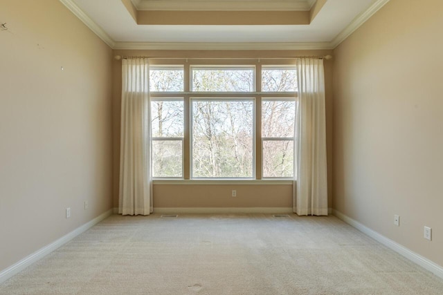 8660 Oakland Hills Cir, Portage, MI 49024 - carpeted empty room with ornamental molding, a tray ceiling, and a wealth of natural light