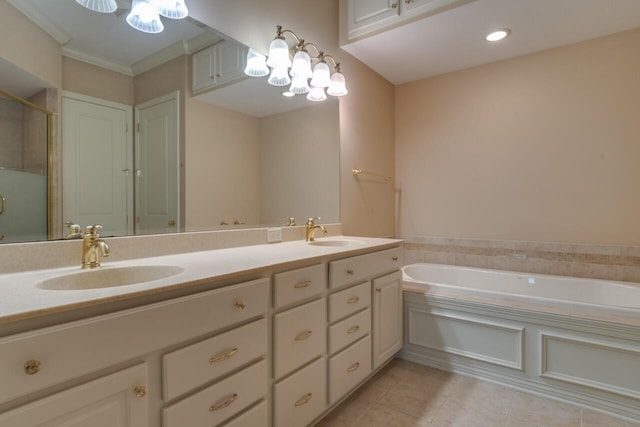 8660 Oakland Hills Cir, Portage, MI 49024 - bathroom with double vanity, tile patterned floors, a sink, and a bath