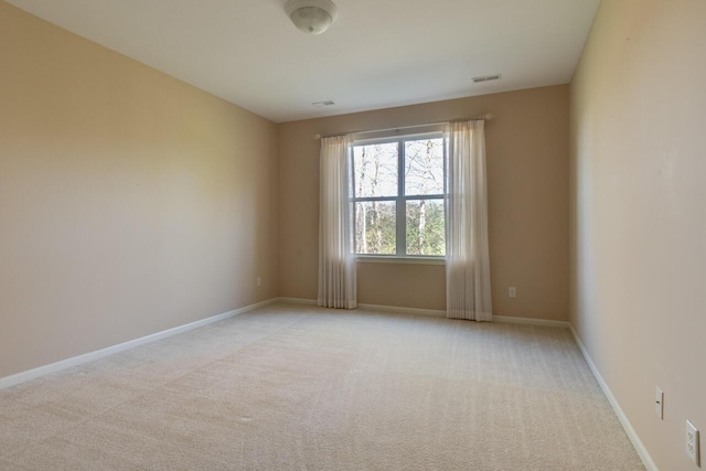 8660 Oakland Hills Cir, Portage, MI 49024 - carpeted empty room featuring baseboards and visible vents