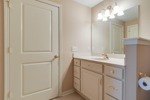 8660 Oakland Hills Cir, Portage, MI 49024 - bathroom featuring vanity, tile patterned flooring, and baseboards