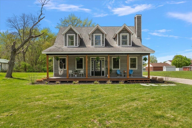 12950 Flynn Rd, Sawyer, MI 49125 - back of house featuring a chimney, a yard, and covered porch