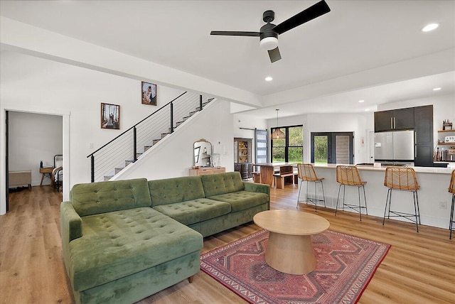 12950 Flynn Rd, Sawyer, MI 49125 - living area with stairs, light wood-type flooring, a ceiling fan, and recessed lighting
