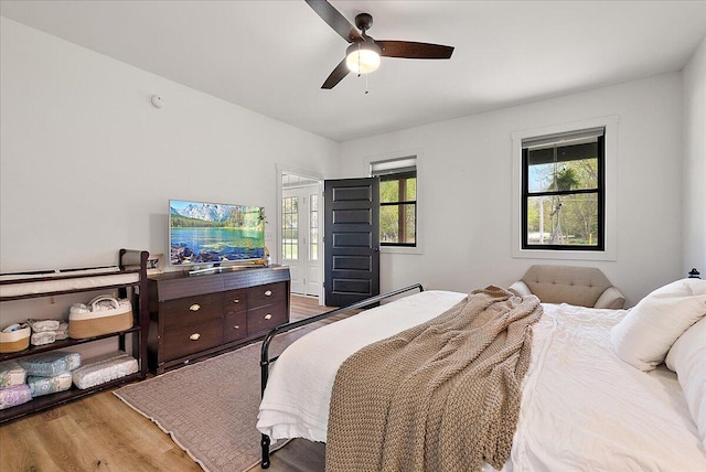12950 Flynn Rd, Sawyer, MI 49125 - bedroom featuring wood finished floors and ceiling fan