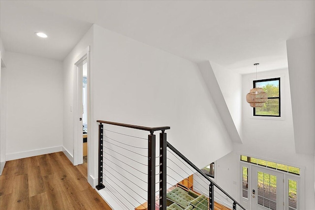 12950 Flynn Rd, Sawyer, MI 49125 - corridor featuring an upstairs landing, wood finished floors, baseboards, and recessed lighting