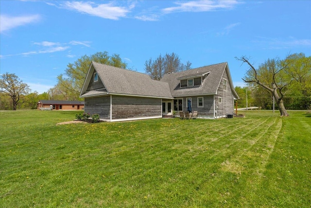 12950 Flynn Rd, Sawyer, MI 49125 - rear view of house with a yard