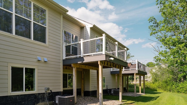3100 Millbury Ln, Ann Arbor, MI 48105 - back of house featuring a wooden deck and a lawn
