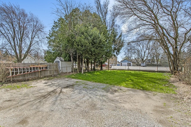 1146 Hall St SE, Grand Rapids, MI 49507 - view of yard with a gate and fence