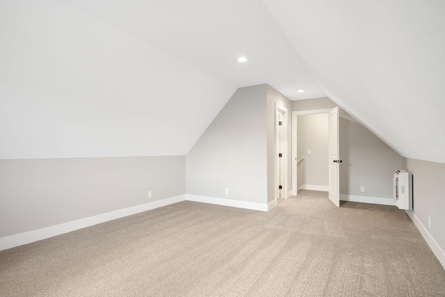 bonus room with carpet floors, recessed lighting, baseboards, and vaulted ceiling