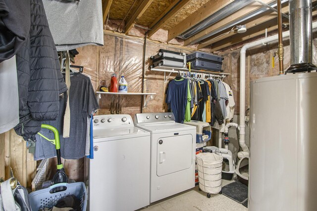 1077 Sun Valley Ln, Allegan, MI 49010 - laundry area with separate washer and dryer, laundry area, and water heater