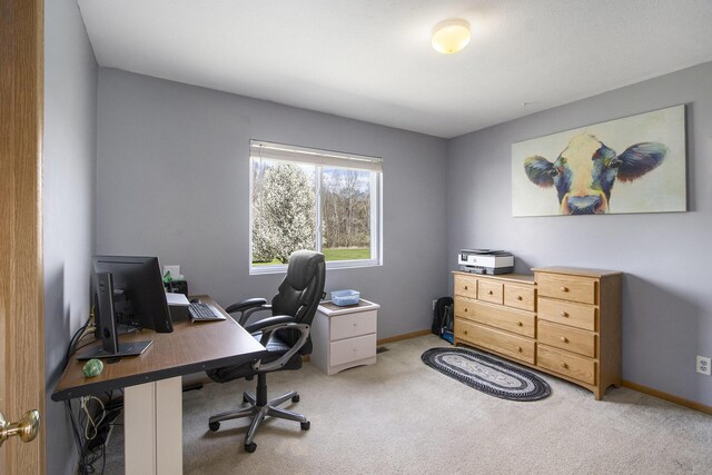 1077 Sun Valley Ln, Allegan, MI 49010 - office area featuring baseboards and light carpet