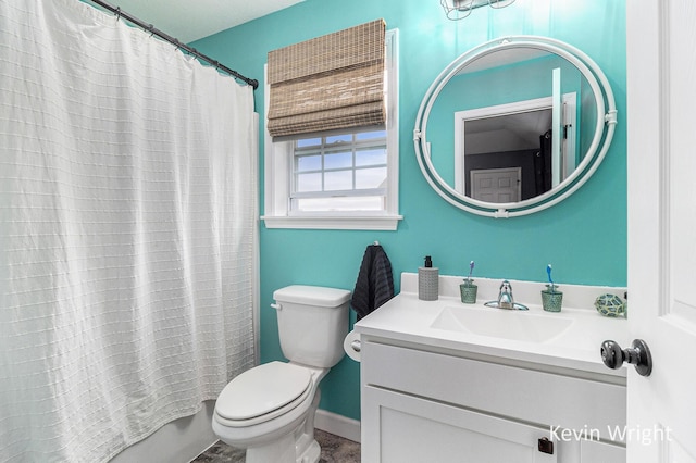 bathroom with vanity, baseboards, toilet, and shower / bathtub combination with curtain