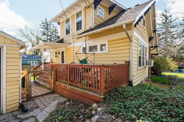1754 Jackson Ave, Ann Arbor, MI 48103 - rear view of house featuring roof with shingles and a wooden deck