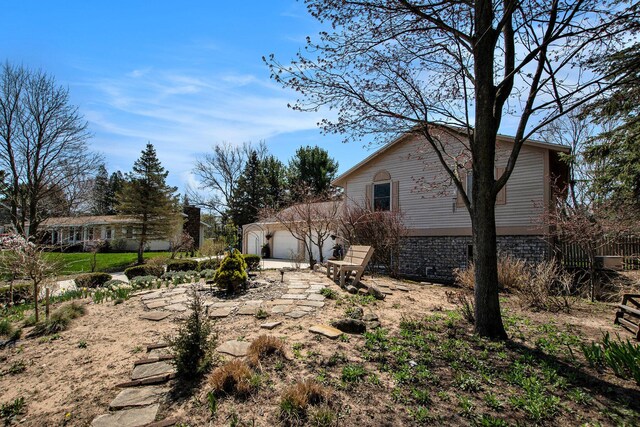 17653 Hiawatha Dr, Spring Lake, MI 49456 - view of yard featuring a garage