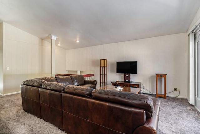 17653 Hiawatha Dr, Spring Lake, MI 49456 - carpeted living room featuring lofted ceiling and baseboards