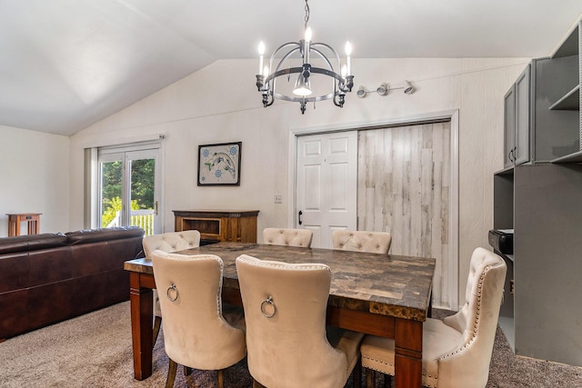 17653 Hiawatha Dr, Spring Lake, MI 49456 - carpeted dining space featuring a chandelier and vaulted ceiling