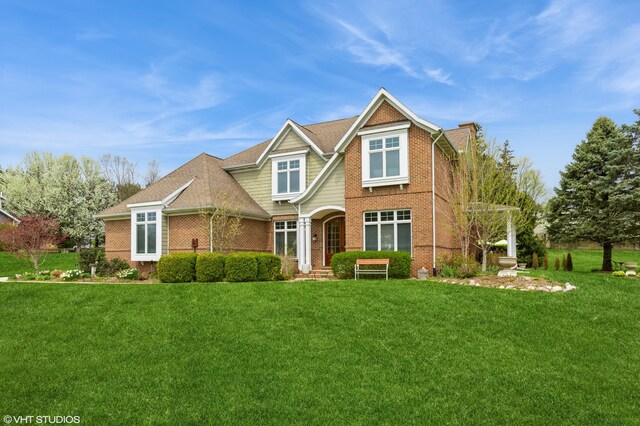 2235 Winters Way, Saint Joseph, MI 49085 - craftsman inspired home featuring brick siding and a front yard