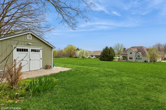 2235 Winters Way, Saint Joseph, MI 49085 - view of yard featuring an outbuilding and a storage unit