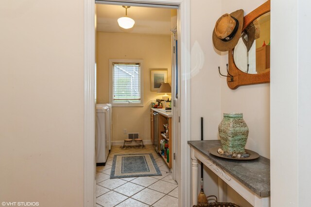 2235 Winters Way, Saint Joseph, MI 49085 - corridor featuring washer / dryer, light tile patterned floors, and visible vents