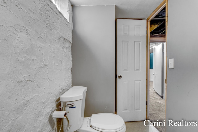 bathroom featuring toilet