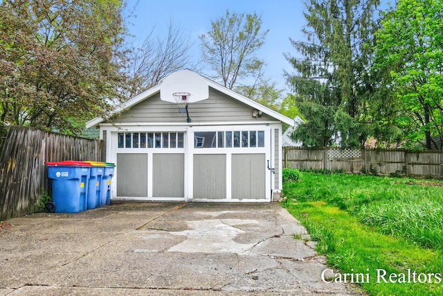 detached garage with fence
