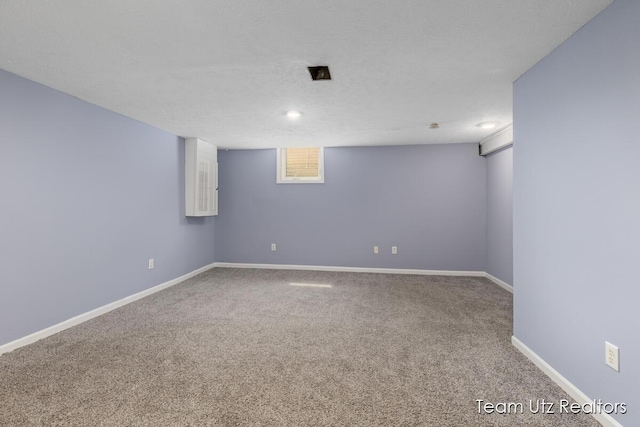 finished basement with carpet floors and baseboards