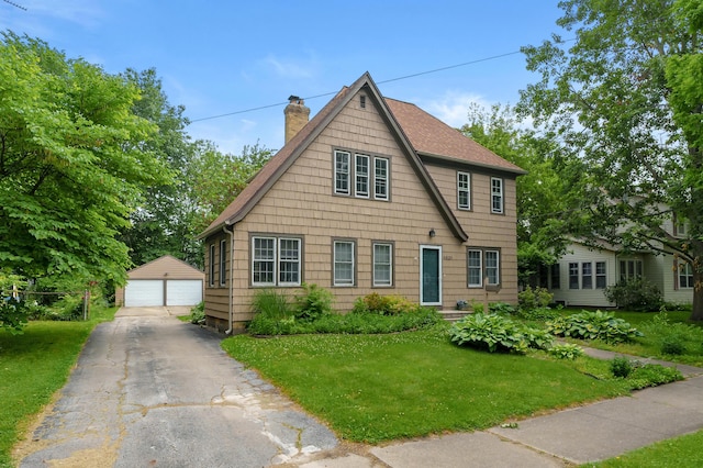 1021 Roseland Ave, Kalamazoo, MI 49001 - view of front of property featuring a chimney, an outdoor structure, a detached garage, a front yard, and roof with shingles