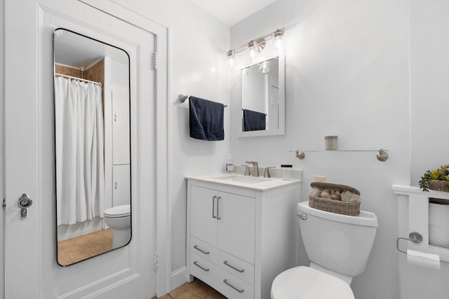 1021 Roseland Ave, Kalamazoo, MI 49001 - full bath with vanity, tile patterned flooring, and a shower with curtain