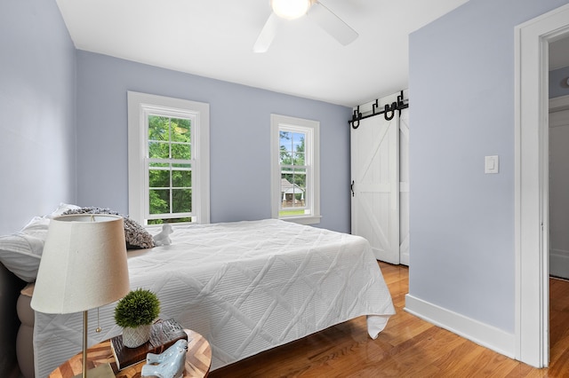1021 Roseland Ave, Kalamazoo, MI 49001 - bedroom with wood finished floors and ceiling fan