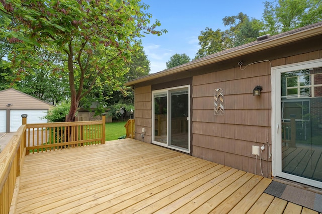 1021 Roseland Ave, Kalamazoo, MI 49001 - deck with an outdoor structure and a garage