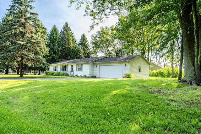 3715 Glen Haven Rd, Saint Joseph, MI 49085 - ranch-style house featuring an attached garage and a front yard