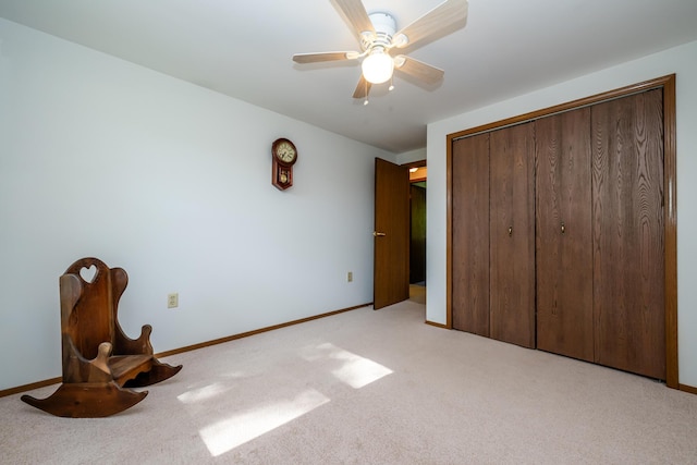 3715 Glen Haven Rd, Saint Joseph, MI 49085 - unfurnished bedroom featuring light carpet, baseboards, and a closet