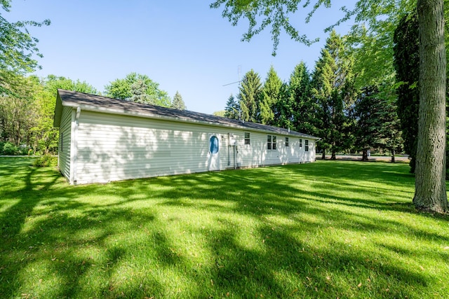 3715 Glen Haven Rd, Saint Joseph, MI 49085 - rear view of house featuring a yard