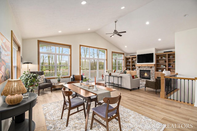 13460 Cottage View Ct, Gowen, MI 49326 - dining room featuring plenty of natural light, light wood finished floors, ceiling fan, a fireplace, and recessed lighting