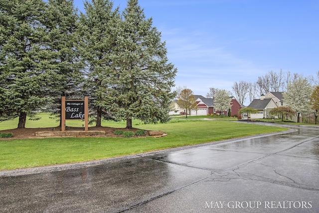 13460 Cottage View Ct, Gowen, MI 49326 - view of green lawn with a residential view