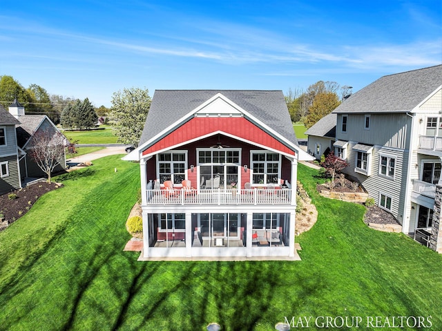 13460 Cottage View Ct, Gowen, MI 49326 - rear view of house featuring ceiling fan and a yard