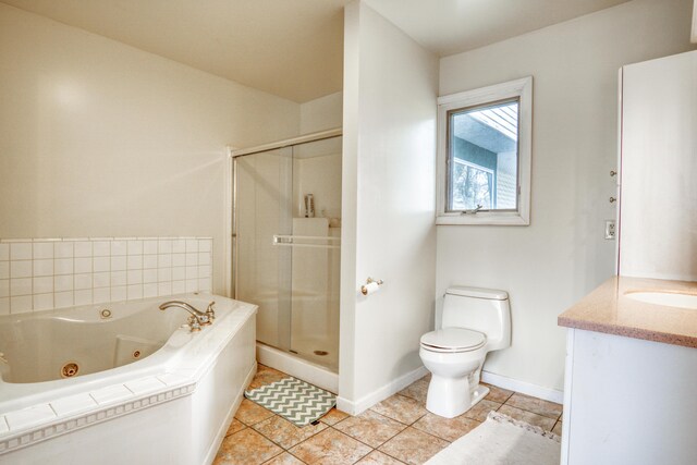 20425 Thornapple Ln, Big Rapids, MI 49307 - full bathroom featuring a jetted tub, tile patterned floors, a stall shower, and toilet