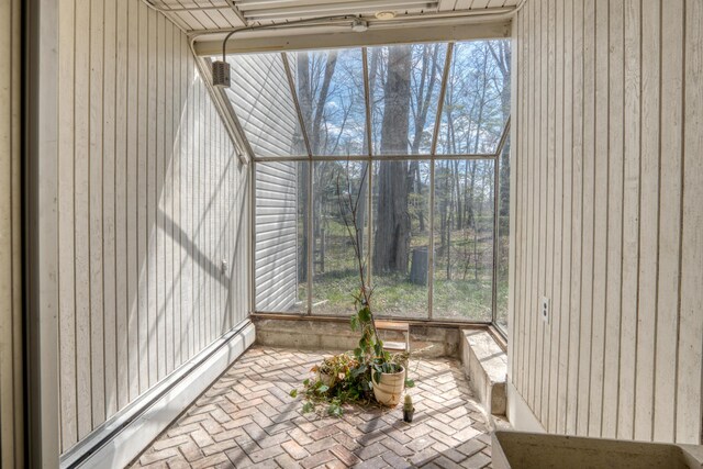 20425 Thornapple Ln, Big Rapids, MI 49307 - sunroom with a baseboard heating unit