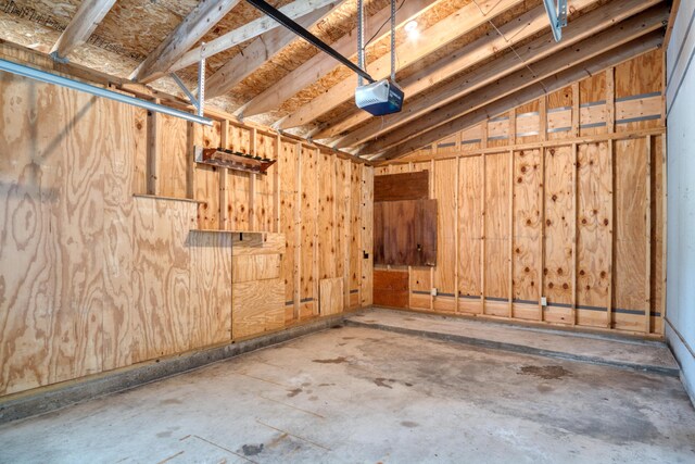 20425 Thornapple Ln, Big Rapids, MI 49307 - garage featuring a garage door opener