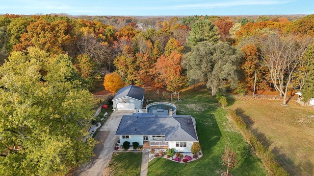 409 Louise Ave, Dowagiac, MI 49047 - drone / aerial view featuring a forest view