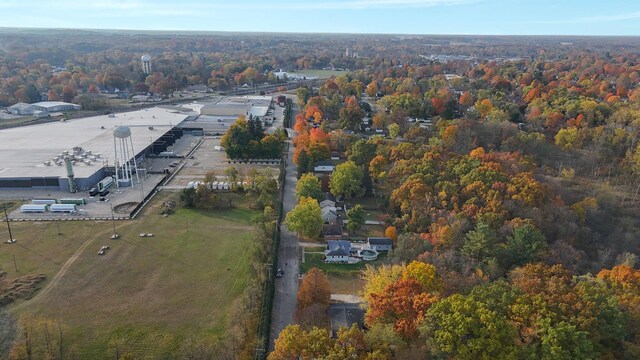 409 Louise Ave, Dowagiac, MI 49047 - drone / aerial view featuring a wooded view