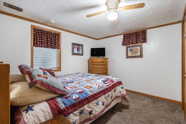 409 Louise Ave, Dowagiac, MI 49047 - carpeted bedroom featuring crown molding, baseboards, and ceiling fan