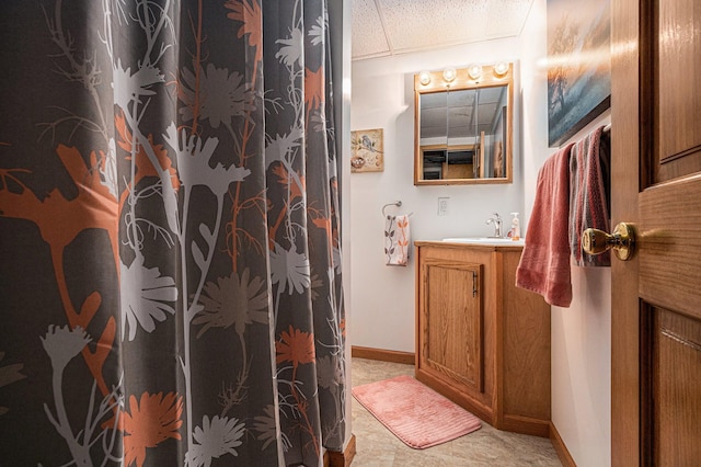409 Louise Ave, Dowagiac, MI 49047 - full bath with a shower with curtain, baseboards, and vanity