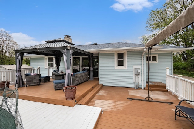 409 Louise Ave, Dowagiac, MI 49047 - wooden deck with a gazebo and an outdoor hangout area