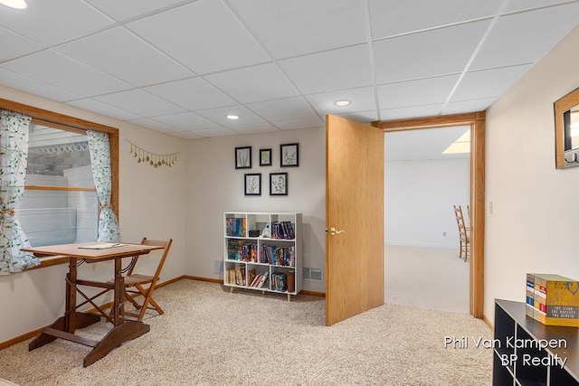 sitting room with carpet floors, baseboards, a drop ceiling, and recessed lighting