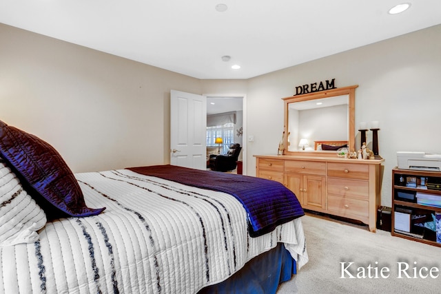 bedroom featuring light colored carpet and recessed lighting